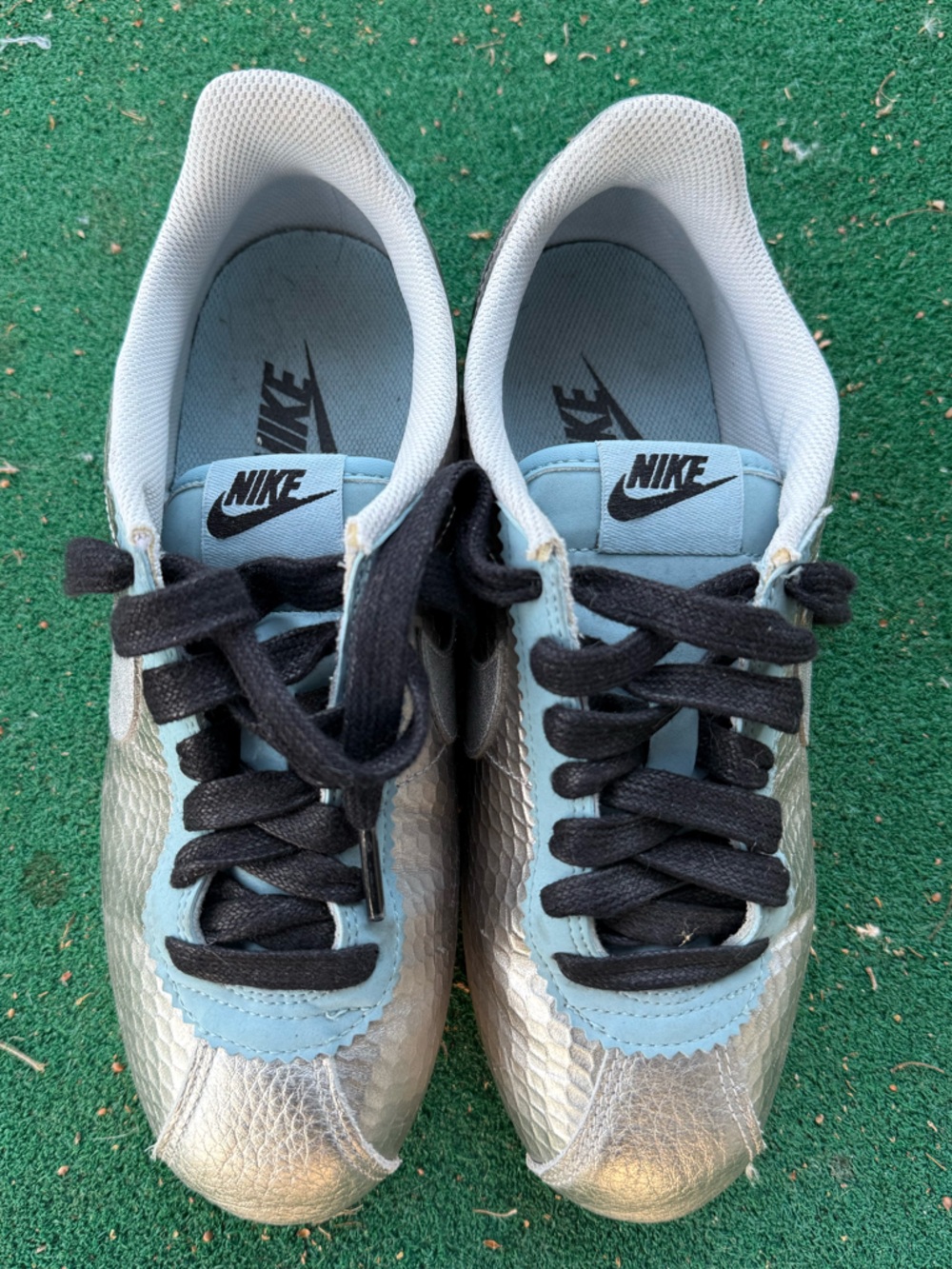 Nike Kids Shiny Silver Sneakers  with Light Blue and Black accents - Size 7